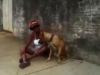 81359 Black Woman Kissing Dog